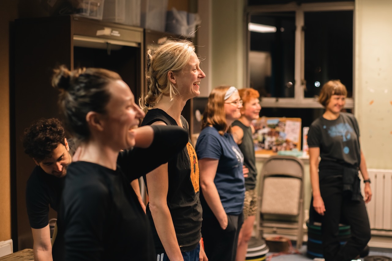 Members laughing during a rest period at one of our Strong & Steady classes